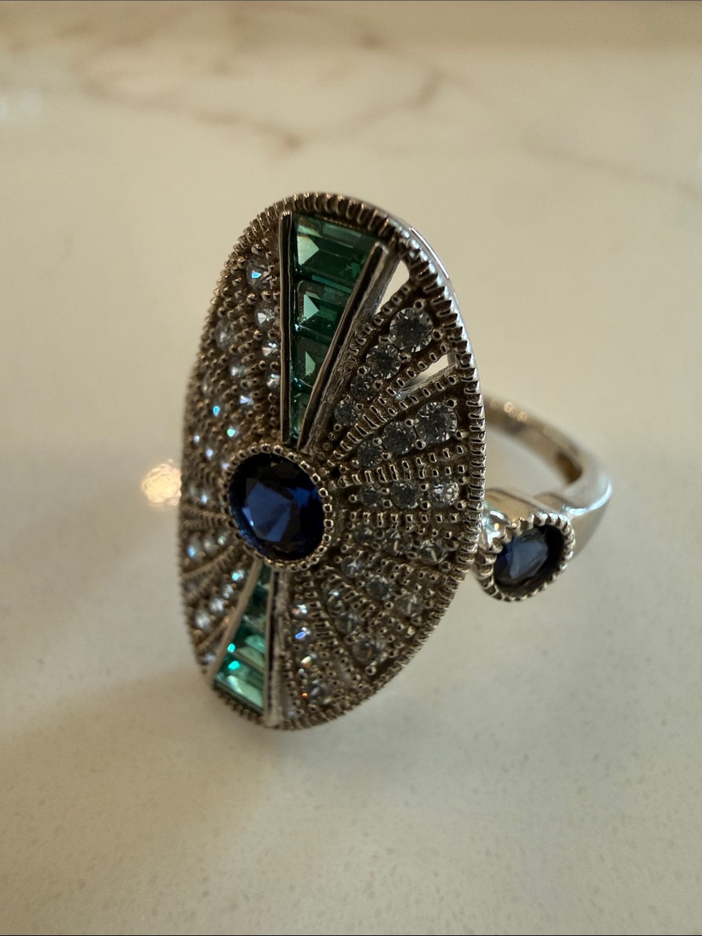 NVDR silver ring with faux gemstones, size 7